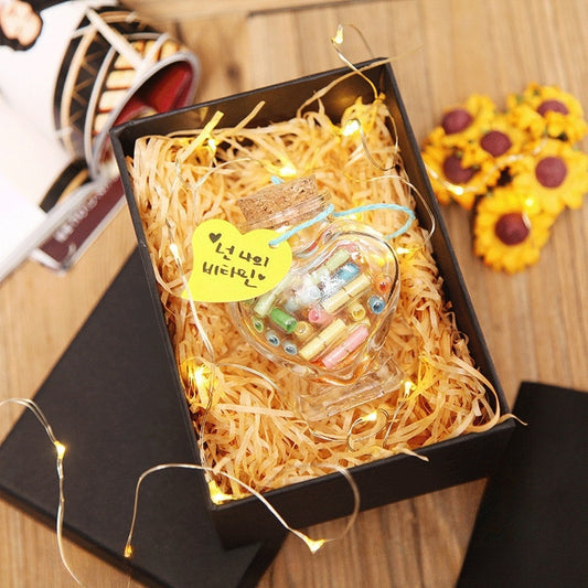 A "Feelings in a Bottle" DIY Message in a Bottle Kit with Capsule Letters