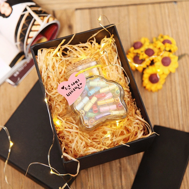 A "Feelings in a Bottle" DIY Message in a Bottle Kit with Capsule Letters